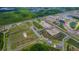 Aerial view of a large residential development with ponds and green spaces at 7434 Sea Manatee St, Parrish, FL 34219
