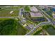 Aerial view of community with new homes and ponds at 7434 Sea Manatee St, Parrish, FL 34219