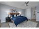 Bright bedroom featuring a cozy bed and en-suite bathroom access at 7457 Sea Manatee St, Parrish, FL 34219