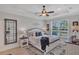 Spacious main bedroom with ceiling fan and large window at 9234 Gulf Haven Dr, Parrish, FL 34219