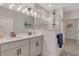 Elegant bathroom with double vanity, large shower, and modern fixtures at 9234 Gulf Haven Dr, Parrish, FL 34219