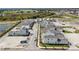 Aerial view of new construction community featuring modern home designs and small lawns at 176 Eagleston Ln, Lakewood Ranch, FL 34240