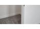 Walk-in closet featuring carpet flooring and white trim at 176 Eagleston Ln, Lakewood Ranch, FL 34240