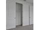 Bedroom closet with white wire shelving and three doors at 176 Eagleston Ln, Lakewood Ranch, FL 34240