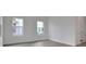 Bright room with tile flooring and two windows, allowing lots of natural light in at 176 Eagleston Ln, Lakewood Ranch, FL 34240