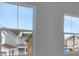 Room featuring two windows with views of a neighborhood with palm trees at 176 Eagleston Ln, Lakewood Ranch, FL 34240