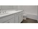 Bright bathroom featuring double vanity with white cabinets, tile floor, and shower at 180 Eagleston Ln, Lakewood Ranch, FL 34240