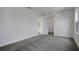 Spacious bedroom with neutral gray carpet and a walk-in closet at 180 Eagleston Ln, Lakewood Ranch, FL 34240