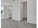 Bright bedroom with a view into the bathroom and closet space at 180 Eagleston Ln, Lakewood Ranch, FL 34240