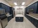 Modern community kitchen with stainless steel appliances and ample cabinetry at 5013 Sevilla Shores Dr, Wimauma, FL 33598