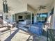 Spacious pool and patio area with access to the living room at 5013 Sevilla Shores Dr, Wimauma, FL 33598