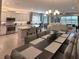 Open floorplan showcasing kitchen, dining, and living areas at 5013 Sevilla Shores Dr, Wimauma, FL 33598