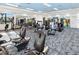 State-of-the-art fitness center with various exercise equipment at 5013 Sevilla Shores Dr, Wimauma, FL 33598