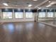 Spacious fitness room with wood flooring, great for exercise at 5013 Sevilla Shores Dr, Wimauma, FL 33598