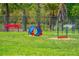 Dog park with agility equipment and benches at 5013 Sevilla Shores Dr, Wimauma, FL 33598