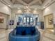Elegant community clubhouse lobby with comfortable seating at 5013 Sevilla Shores Dr, Wimauma, FL 33598