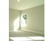 Bright bedroom with a large window at 17434 Crisp Apple Ln, Land O Lakes, FL 34638