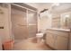 Clean bathroom with shower/tub combo, vanity, and updated fixtures at 38335 Eucalyptus Dr, Zephyrhills, FL 33542
