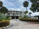 Sarabay Cove community featuring a two-story building with landscaping at 1714 69Th W Ave # B301, Bradenton, FL 34207