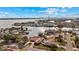 Aerial view of waterfront home with solar panels, showcasing a desirable location and neighborhood at 351 Harbor Psge, Clearwater Beach, FL 33767