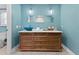 Bathroom with a modern vanity and blue glass sink at 351 Harbor Psge, Clearwater Beach, FL 33767