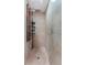 Spa-like shower with multiple shower heads and a glass enclosure at 351 Harbor Psge, Clearwater Beach, FL 33767