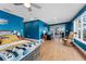 Bright bedroom with wood floors and sliding doors to the patio at 351 Harbor Psge, Clearwater Beach, FL 33767