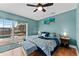 King-size bedroom with pool view and sliding glass doors at 351 Harbor Psge, Clearwater Beach, FL 33767