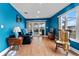Relaxing living room with hardwood floors and access to a patio at 351 Harbor Psge, Clearwater Beach, FL 33767