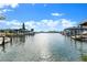 Canal view with neighboring houses and boats at 351 Harbor Psge, Clearwater Beach, FL 33767