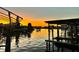 Stunning sunset over the canal, boats docked along the waterway at 351 Harbor Psge, Clearwater Beach, FL 33767
