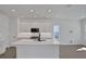 Modern kitchen featuring white cabinets, stainless steel appliances, and undermount sink at 9019 Rothman Ln, Lakewood Ranch, FL 34240