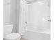 This bathroom has a tub and shower with a toilet at 13557 Willow Bluestar Loop, Riverview, FL 33579