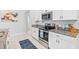Contemporary kitchen with granite counters and stainless steel appliances at 13557 Willow Bluestar Loop, Riverview, FL 33579