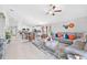 Expansive living area showing an open floor plan, with a kitchen, dining area, and living room at 13557 Willow Bluestar Loop, Riverview, FL 33579
