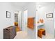 Bright bathroom boasts neutral tile floors, white walls, and a modern vanity area at 909 Dawn St, Venice, FL 34285