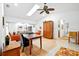 Open living room features hardwood floors, skylight, and comfortable seating at 909 Dawn St, Venice, FL 34285