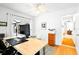 Modern office with bright natural light and backyard pool views at 909 Dawn St, Venice, FL 34285