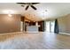 Open living room and kitchen area with modern finishes and lots of natural light at 4154 Duluth Ter, North Port, FL 34286