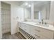 Bathroom featuring a double sink vanity with modern fixtures and plenty of storage space at 4007 Bangalow Palm Ct # 4007, Tampa, FL 33624