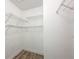 Walk-in closet featuring shelving for optimal storage solutions at 4007 Bangalow Palm Ct # 4007, Tampa, FL 33624