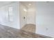 Bright foyer with tile flooring, white walls, and modern fixtures with views of the living room at 4007 Bangalow Palm Ct # 4007, Tampa, FL 33624