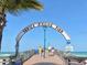 Venice Fishing Pier entrance featuring a classic archway with ocean views beyond at 933 Harbor S Dr, Venice, FL 34285