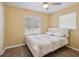 Bedroom with hardwood floors and natural light at 33021 Ranch Rd, Dade City, FL 33523