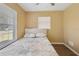 Bedroom with hardwood floors and natural light at 33021 Ranch Rd, Dade City, FL 33523