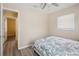 Bedroom featuring light colored hardwood floors at 33021 Ranch Rd, Dade City, FL 33523