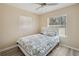Bright bedroom with lots of light and neutral colored walls at 33021 Ranch Rd, Dade City, FL 33523