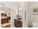 Elegant bathroom featuring a stylish vanity, vessel sink, and modern fixtures at 7157 Knoxville Dr, Webster, FL 33597