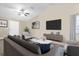 Comfortable living room with vaulted ceilings, modern furniture, and a view of the outdoors at 7157 Knoxville Dr, Webster, FL 33597