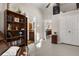Comfortable office area with bookshelves and natural light, located near the kitchen at 7157 Knoxville Dr, Webster, FL 33597